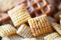 A close up of Chex cereal mix.